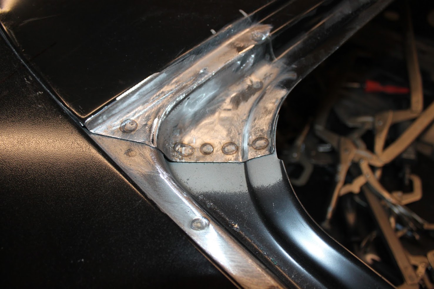Attached picture trunk lip detail spot welds.JPG
